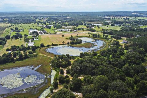 Купить виллу или дом в Хоуи-ин-Хиллз, Флорида 5 комнат, 260.13м2, № 1851740 - фото 7