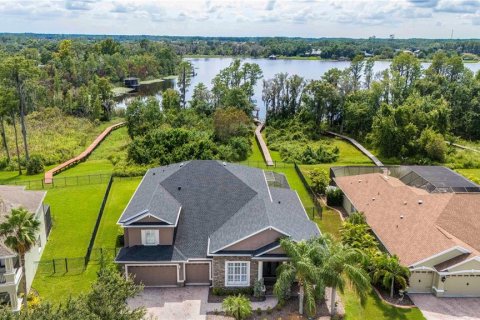 House in Land O' Lakes, Florida 5 bedrooms, 406.45 sq.m. № 1914636 - photo 1