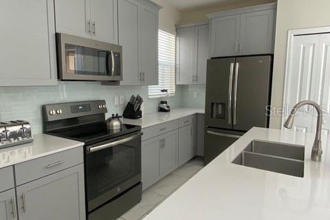 House in Kissimmee, Florida 5 bedrooms, 278.34 sq.m. № 2348193 - photo 7