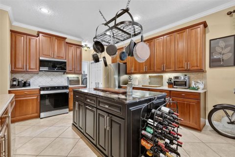 House in Mount Dora, Florida 5 bedrooms, 411.09 sq.m. № 2157801 - photo 19