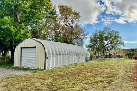 House in Okeechobee, Florida 3 bedrooms, 312.52 sq.m. № 2182773 - photo 6