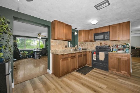 House in Holiday, Florida 2 bedrooms, 110.46 sq.m. № 2157694 - photo 10