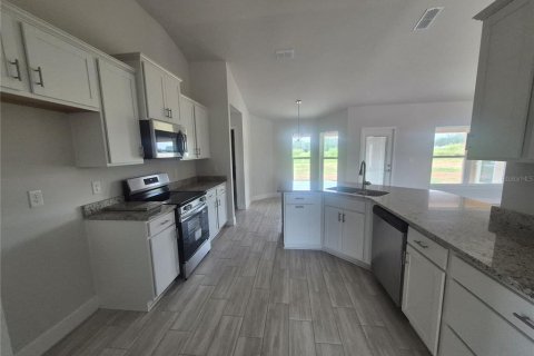 Casa en venta en Dade City, Florida, 4 dormitorios, 216.46 m2 № 1914527 - foto 13