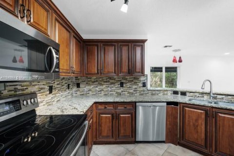 House in Parkland, Florida 4 bedrooms, 239.59 sq.m. № 1832378 - photo 14