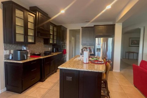 House in Kissimmee, Florida 5 bedrooms, 322.84 sq.m. № 2421835 - photo 13