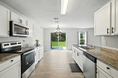 House in Palm Coast, Florida 5 bedrooms, 211.26 sq.m. № 1911507 - photo 24