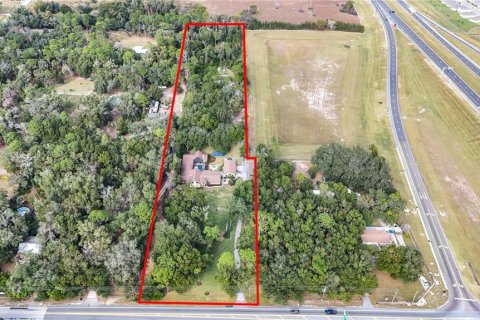 House in Apopka, Florida 6 bedrooms, 587.05 sq.m. № 2213644 - photo 5