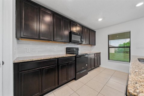 House in Dundee, Florida 5 bedrooms, 182.55 sq.m. № 2412630 - photo 24