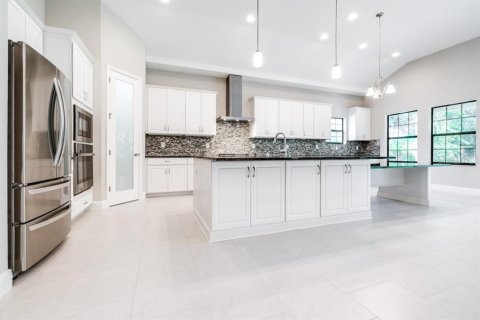 House in Land O' Lakes, Florida 5 bedrooms, 291.53 sq.m. № 1681556 - photo 14