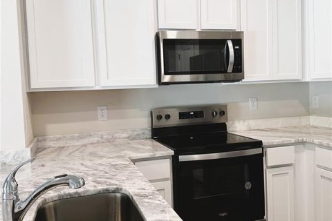 Снять в аренду таунхаус в Палм-Харбор, Флорида 1 комната, 135.92м2, № 1615398 - фото 18