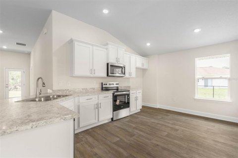 House in Palm Coast, Florida 3 bedrooms, 139.82 sq.m. № 1587673 - photo 14
