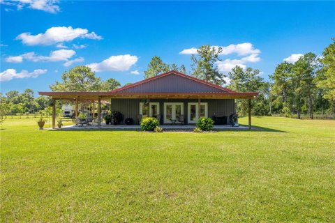House in Fort MC Coy, Florida 3 bedrooms, 209.59 sq.m. № 1905896 - photo 1