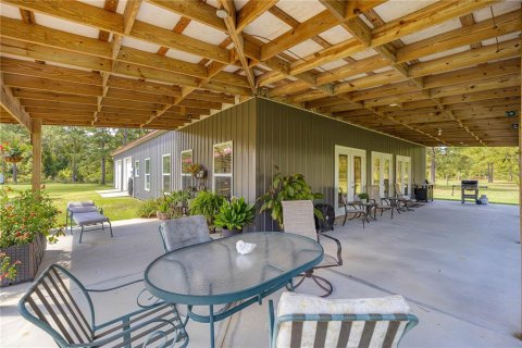 House in Fort MC Coy, Florida 3 bedrooms, 209.59 sq.m. № 1905896 - photo 7