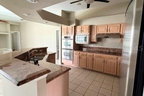House in Clermont, Florida 4 bedrooms, 245.26 sq.m. № 2196785 - photo 7