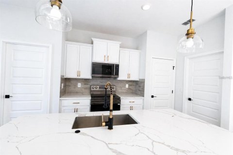 House in Palm Coast, Florida 4 bedrooms, 167.22 sq.m. № 2114057 - photo 17