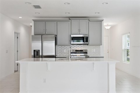 House in TRINITY LAKES in Groveland, Florida 4 bedrooms, 143.07 sq.m. № 2097021 - photo 12