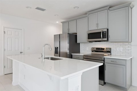 House in TRINITY LAKES in Groveland, Florida 4 bedrooms, 143.07 sq.m. № 2097021 - photo 11