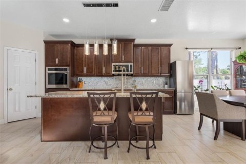 House in Palm Coast, Florida 6 bedrooms, 367.61 sq.m. № 2213511 - photo 4