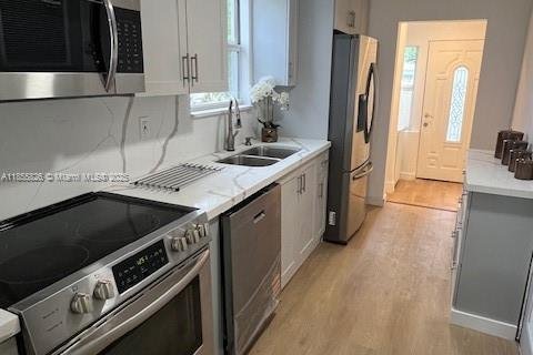 Casa en alquiler en Miami, Florida, 4 dormitorios, 125.23 m2 № 1878346 - foto 7