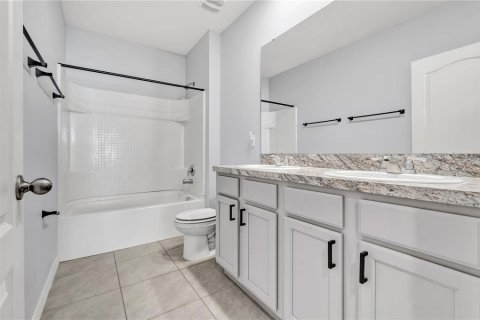House in Davenport, Florida 5 bedrooms, 234.3 sq.m. № 2418978 - photo 15