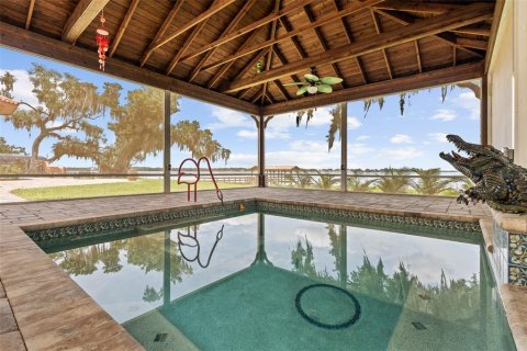 House in Leesburg, Florida 3 bedrooms, 343 sq.m. № 2295041 - photo 4