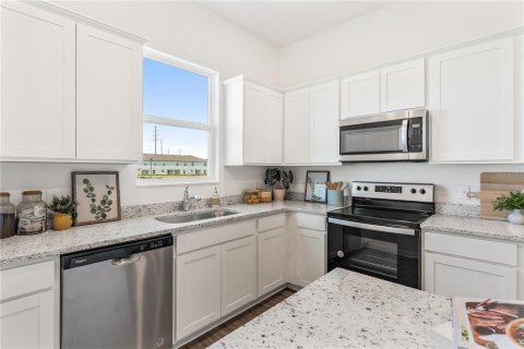 Townhouse in Dundee, Florida 3 bedrooms, 160.81 sq.m. № 1899283 - photo 13