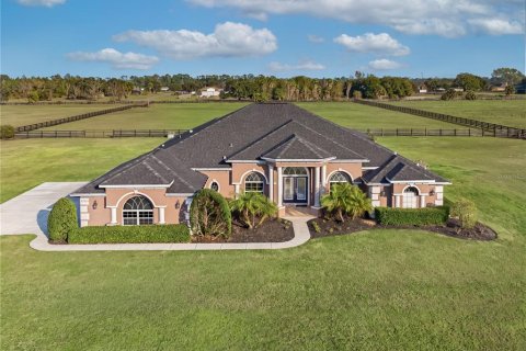 House in Tavares, Florida 4 bedrooms, 327.11 sq.m. № 2236172