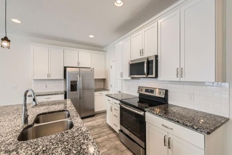 Adosado en venta en Winter Garden, Florida, 4 dormitorios, 189.24 m2 № 1844945 - foto 9
