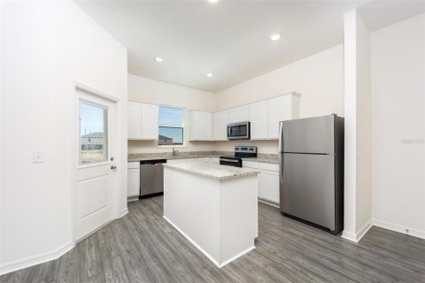 Townhouse in Dundee, Florida 3 bedrooms, 160.81 sq.m. № 2215314 - photo 5