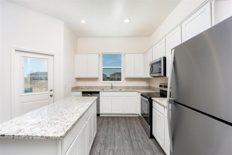 Townhouse in Dundee, Florida 3 bedrooms, 160.81 sq.m. № 2215314 - photo 7