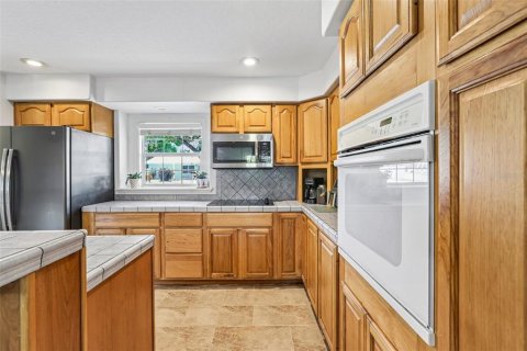 House in Palm Harbor, Florida 4 bedrooms, 311.59 sq.m. № 2304732 - photo 12