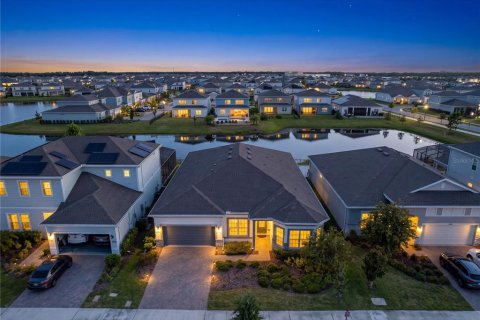 House in ISLES OF LAKE NONA in Orlando, Florida 4 bedrooms, 274.15 sq.m. № 2329775
