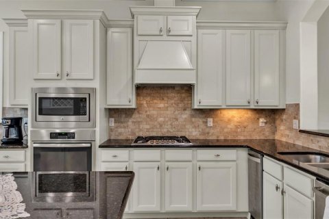House in Lakeland, Florida 5 bedrooms, 404.68 sq.m. № 1898577 - photo 17