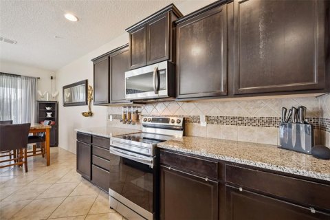 House in Polk City, Florida 5 bedrooms, 250.19 sq.m. № 2150816 - photo 7