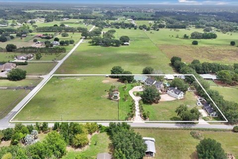 House in Oxford, Florida 5 bedrooms, 471.66 sq.m. № 1919813 - photo 27
