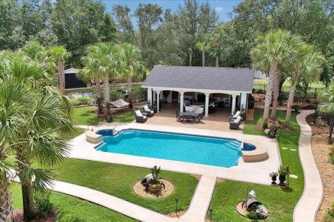 House in Oxford, Florida 5 bedrooms, 471.66 sq.m. № 1919813 - photo 4