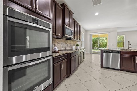 Купить виллу или дом в Уэсли-Чепел, Флорида 12 комнат, 319.31м2, № 2195626 - фото 24
