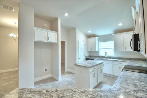 House in MAGNOLIA PARK in Haines City, Florida 3 bedrooms, 131.46 sq.m. № 1821468 - photo 12