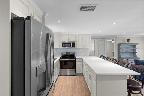 House in Holiday, Florida 4 bedrooms, 141.21 sq.m. № 1853613 - photo 13