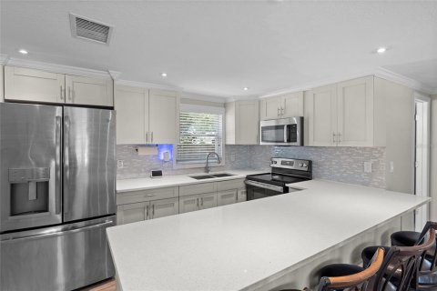 House in Holiday, Florida 4 bedrooms, 141.21 sq.m. № 1853613 - photo 12