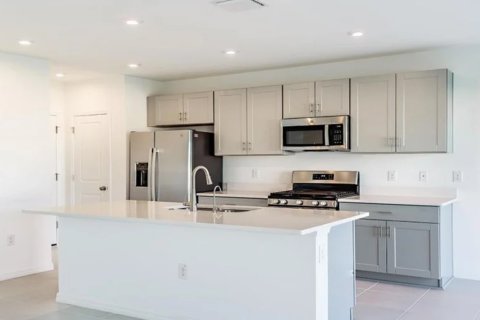 House in EAVE'S BEND AT ARTISAN LAKES in Palmetto, Florida 3 bedrooms, 172 sq.m. № 196376 - photo 1