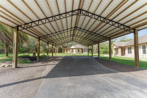 House in Ocklawaha, Florida 7 bedrooms, 561.5 sq.m. № 1793616 - photo 9