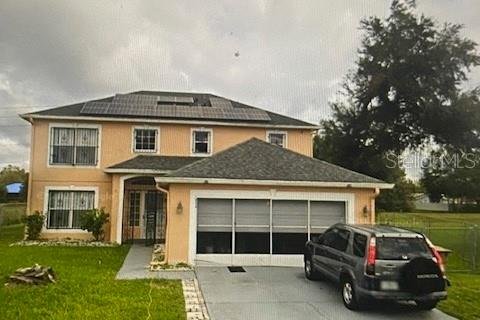 House in Kissimmee, Florida 4 bedrooms, 198.35 sq.m. № 1736439 - photo 1