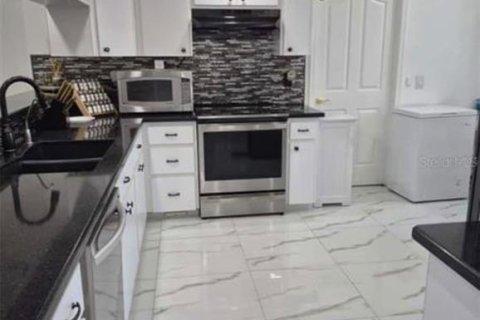 Casa en venta en New Port Richey, Florida, 4 dormitorios, 216.65 m2 № 2386308 - foto 9
