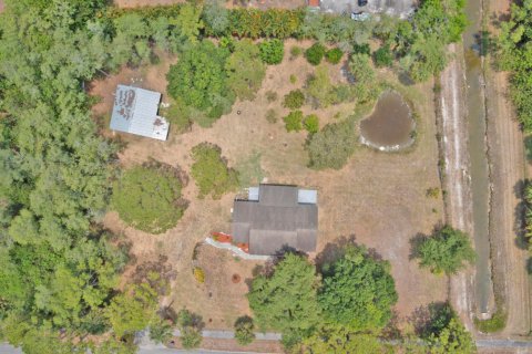 House in The Acreage, Florida 3 bedrooms, 115.94 sq.m. № 1182149 - photo 1