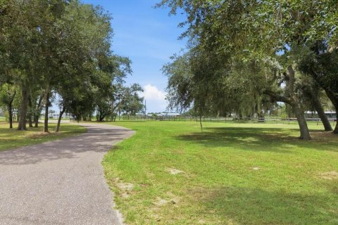 House in Myakka City, Florida 5 bedrooms, 468.88 sq.m. № 2197631 - photo 11