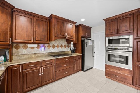 House in Jupiter, Florida 4 bedrooms, 235.04 sq.m. № 2365208 - photo 14