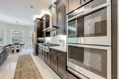 Купить виллу или дом в Уиндермир, Флорида 10 комнат, 311.78м2, № 1656879 - фото 26