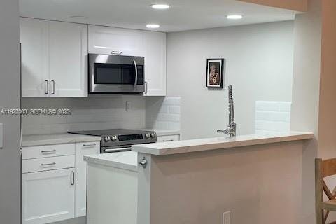 Снять в аренду таунхаус в Майами, Флорида 2 спальни, 92.9м2, № 1986052 - фото 8