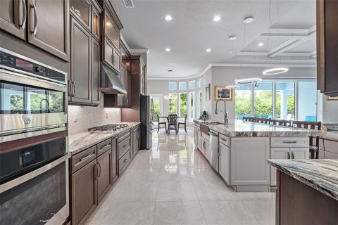 House in Ormond Beach, Florida 5 bedrooms, 506.69 sq.m. № 2108763 - photo 23
